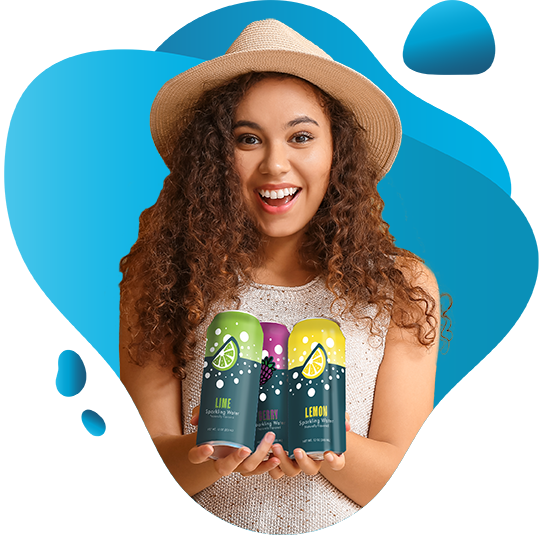 Happy woman with long brown hair is holding three beverage cans.