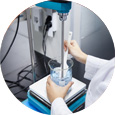 Quality technician performing tests in lab